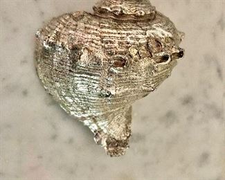 $45 Silver shell.  3" W, 3" H. 
