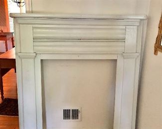 $175 Antique carved wood painted mantle.  51" W, 7" D, 56 " H;  opening 31" W x 39" H. 