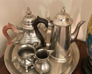 $150  Williamsburg pewter coffee/tea set.  Tray 14" diam, coffee pot 9.5" H, tea pot 9" H. 
