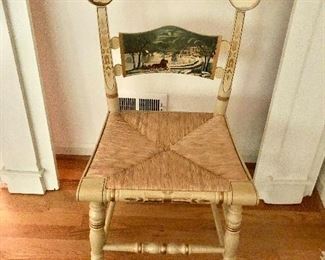 $120 Painted Hitchcock chair with rush seat.  17.5" W, 15" D, 35" H. 