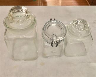 $ 20 Large glass canister, $10 each smaller glass canister.  6.5" H to 9.5" H. 