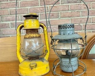  Pair of vintage lanterns; $80/left; $30/right.  Left 6.5" diam, 16.5" H; right 6.5" diam, 15" H.  Lantern on right is SOLD.