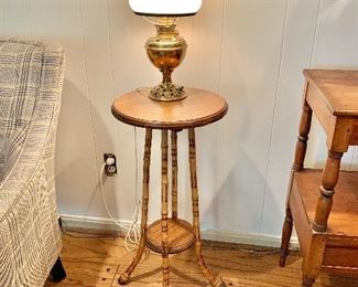 $125 Vintage bamboo side table.  13" diam, 29" H. 