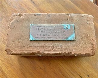$75 Vintage Lowe's Grand Theater brick.  Approx 8" x 4" x 2.5".