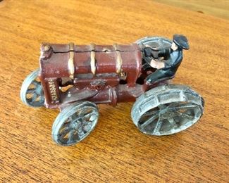 $40 Antique toy tractor.  5.5" W, 3" D, 4" H. 