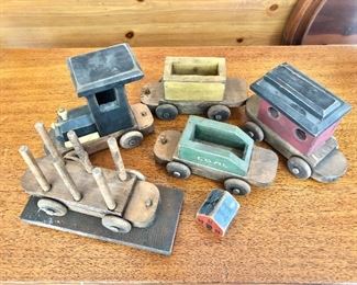 $70 Vintage painted wood train set.  Each approx 7" L x 3" to 6" H. 
