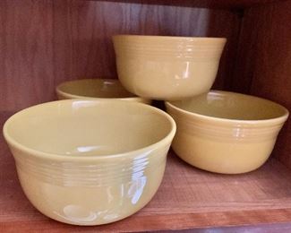 $40 Set of 4 Yellow "Fiesta" bowls.  6" diam, 3" H.  They are bright yellow!