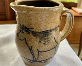 $20 Small stoneware cow pitcher.  4" diam, 5" H. 