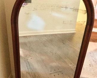 $100 Arched mirror AS IS, 21" W x 35" H.