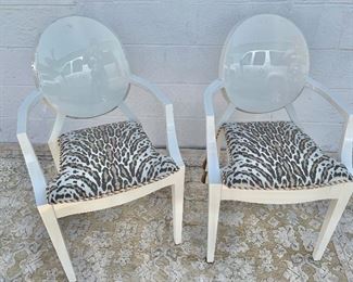 $120 for pair of "Mrs." and "Mr." high quality plastic arm chairs, with animal print seat cushions.  37"H x 17"D x 21"W