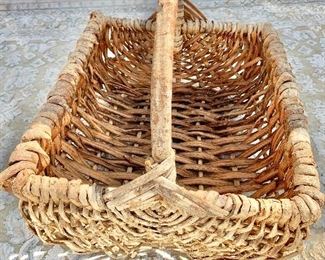 Detail; Large twig basket with handle. 21.5"H x 21.5"D x 24.5"W