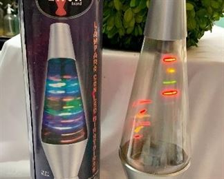 $15 each - 8 available. IN BOX, Lava Lamp.  27" Tall with silver base.