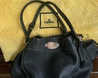 Genuine Fendi Black leather hobo style with tan topstiching 
14” x 10” x5”
Gently used
Serial No.   
With dust cover
$600