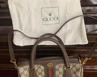 Genuine vintage Gucci small tote
Gently used 2 way straps
Leather and canvas
11” x 7” x 5”. With Dust cover
$595