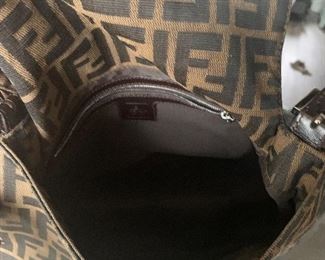 ‪‪Fendi - pre-owned. $575‬‬
‪‪Very gently Zucca Mamma Baguette tote‬‬
‪‪Highlights‬‬
* ‪‪brown/black‬‬
* ‪‪canvas/leather‬‬
* ‪‪Adjustable strap‬‬
* ‪‪signature Zucca monogram pattern‬‬
* ‪‪silver-tone hardware‬‬
* ‪‪internal logo patch‬‬
* ‪‪FF logo plaque‬‬
* ‪‪foldover top with magnetic fastening‬‬
* ‪‪internal zip pocket‬‬
* ‪‪full lining‬‬
‪‪Made in Italy‬‬
‪‪Composition‬‬
‪‪Leather 100%, Canvas 100%‬‬