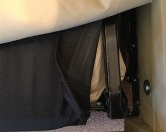 Black metal support under structure