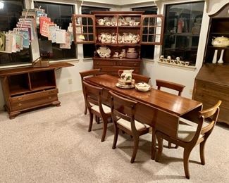 Mid Century Modern, Made by STERLINGWORTH CORP., Jamestown, NY, with Double-Drop-Leaf long Table & 6 Chairs, Fold-Out- Buffet with Silverware Drawer, and a 2-Piece China Cabinet, and a large set of FRANCISCAN dishes