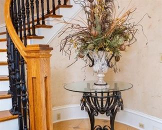 Lot #1 Tall Decorative Flower Arrangement & Vase with Iron Handles 53” tall 

* ———

Lot #2 Round Glass and Metal Entry Table 36” diameter x 31.5” tall