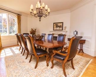 Lot #24  — Eight (8) American Drew Dining Room Leather Chairs & With Crocodile Embossed Leather — 24” Wide x Seat is 19” high x 42” Tall in Back.  — American Drew Cherry Grove Pedestal Dining Room Table is 46" Wide x 30.5" Tall x 118" Long (includes 2 leafs 20" Wide Each).
* ———
Lot #25  — Hand Made Persian Oriental Rug — 
9’ 7” x 14.5” 
