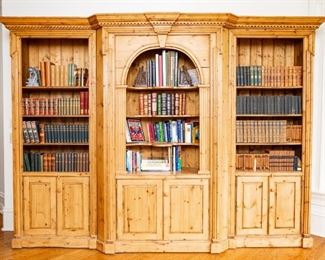 Lot #46 — Large 3 Piece Bookcase —&nbsp;Measures 19” deep x 23” Deep in Center x 127” Wide x 95” Tall — Top Shelves are 27" Tall — Bottom Three (3) shelves are 11" Tall — Doors are 25" Tall.  
