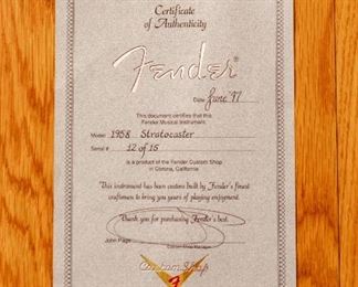 Certificate for Lot #G20 — 1997 Fender Custom Shop 58 re-issue Stratocaster Daphne Blue #12 of 15 only. “Closet find” never been played- brand new