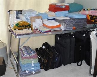 Linens, luggage, suitcases 