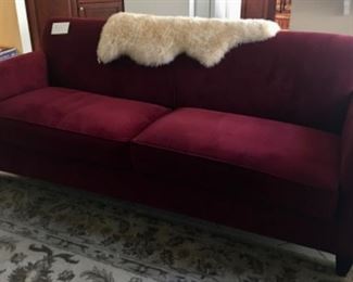 Crate and Barrel burgundy velvety couch