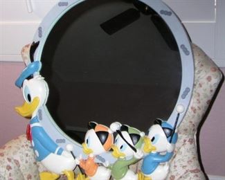 Item 58:
Vintage Donald Duck Disney Mirror - Bassett - Mirror approx. 18" in diameter - Overall size 22" wide x 24.5" tall - Hard plastic - Excellent condition!
Asking Price: $175.00
