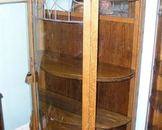 Item 27:
Antique Rounded Curio Cabinet with Curved Glass - 4 Shelves - Light Oak with Claw Feet - Leaded Glass on Front - 37" wide x 14.5" deep x 56.5" tall
Asking Price: $395.00
