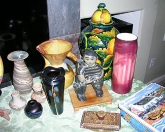 Nice selection of collectibles, pottery and tins.