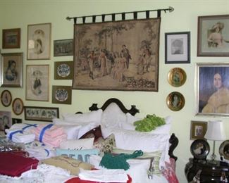 There is a beautiful selection of wall art and vintage linens!