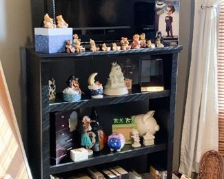 Bookshelf, Flatscreen TV, Bear Figurines, Toys, Piggy Banks, Books, Etc.