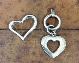 LEFT: OTC sterling silver heart pendant, size 1" wide by 3/4" high. Signed OTC, stamped 925. $40            RIGHT: Silpada sterling silver heart pendant, size 3/4" wide by 1 3/4" high. Signed with Silpada mark, stamped 925. $48