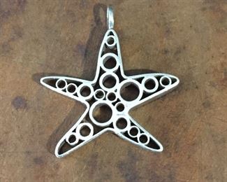 Vintage sterling star pendant, size 15/16" wide by 1 1/8" tall (including bale). Signed FIS, stamped 925S. $60