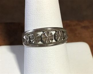 Beverly Hills Silver ring size 8. Diamond-cut sterling. Face of ring is 3/4" w x 5/16" h. Signed BEVERLY HILLS SILVER, stamped 925. $44