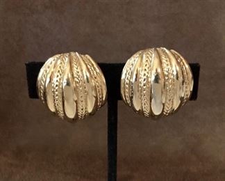 St. John classic gold-tone metal clip earrings. Size 1" wide by 1" high. Signed St. John on clip. $50