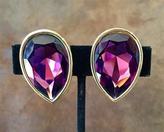Swarovski  S.A.L. large teardrop-shaped clip earrings with large faceted purple crystals. Size 1" wide by 1 3/8" high. Signed S.A.L. on back. $70