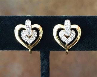 Swarovski gold-tone and clear crystal petite clip earrings. Size 7/16" wide by 7/16" high. Signed SWAROVSKI on clip backs and stamped with circular swan logo on back. $40 