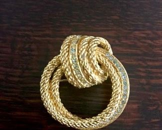 Christian Dior signed vintage circle pin with clear crystals set in goldtone.  1.25" by 1.5".  $88