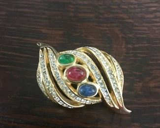 Signed Christian Dior vintage clear crystal and colorful glass cabochon brooch.  2" wide by 1" tall.  $220