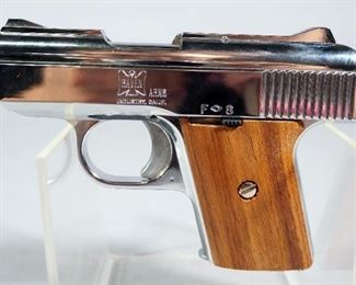 Raven Arms Model MP-25 .25 Auto Pistol SN# 850168, Walnut Grips, Believed To Be Unfired, 2 Total Mags, With Instructions, In Original Box