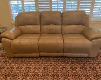 This couch is leather and has duel electric recliners-from star furniture