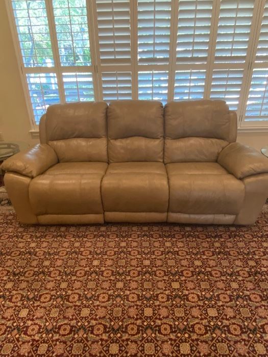 This couch is leather and has duel electric recliners-from star furniture