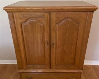 Armoire with shelving and storage drawer 36"x21"x48"