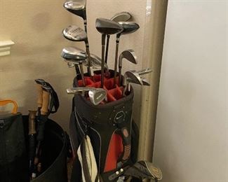 set of golf clubs with bag