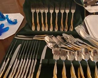 Oneida stainless flatware set "Golden Aquarius" 88pc currently retailing for $600