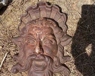 Cast iron sun God wall art