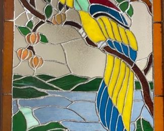 Stained glass window of a parrot