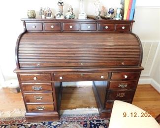 Nice roll top desk.
