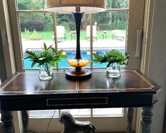 Leather top accent table with lion base